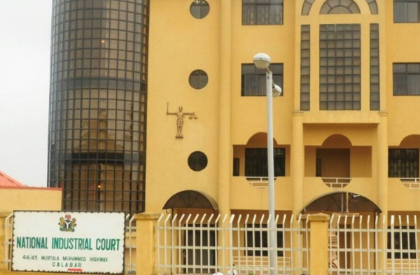 Justice E.D. Subilim delivering a ruling at the National Industrial Court in Abuja on the FCT workers’ strike case.