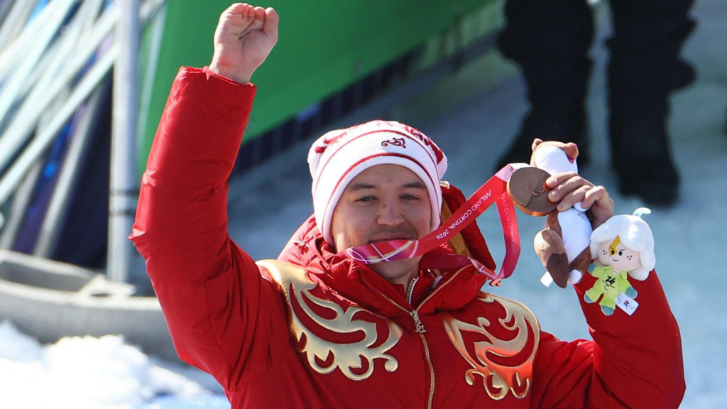 Russian skier Varvara Voronchikhina celebrates after winning the women’s super-G event at the Winter Paralympics in Cortina.